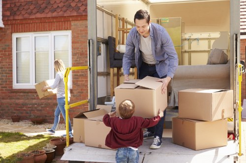 Man with van moving household items during a booked service