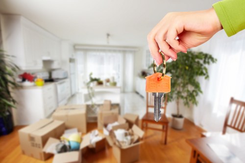 Careful boxing and labelling of household items during a Southfields packing service
