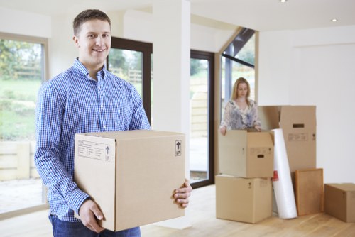 Local Southfields removals team handling boxes and furniture