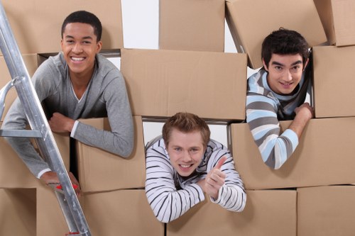 Charity donation boxes and furniture set aside for reuse