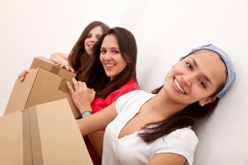 Flat removals process in Southfields with careful carrying of items