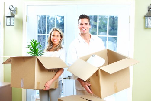 Local movers loading boxes for a Southfields property move